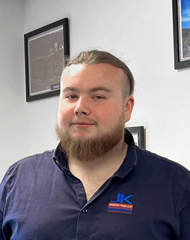 A photograph of our assistant quantity surveyor Rhodri inside the JK offices.